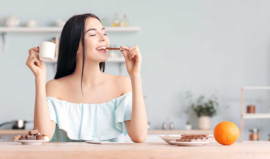 Woman Eating Edible Chocolate